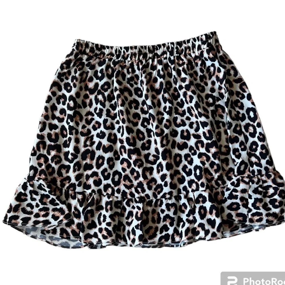 Princess Polly elastic waist animal print leopard ruffle mini skirt size 4